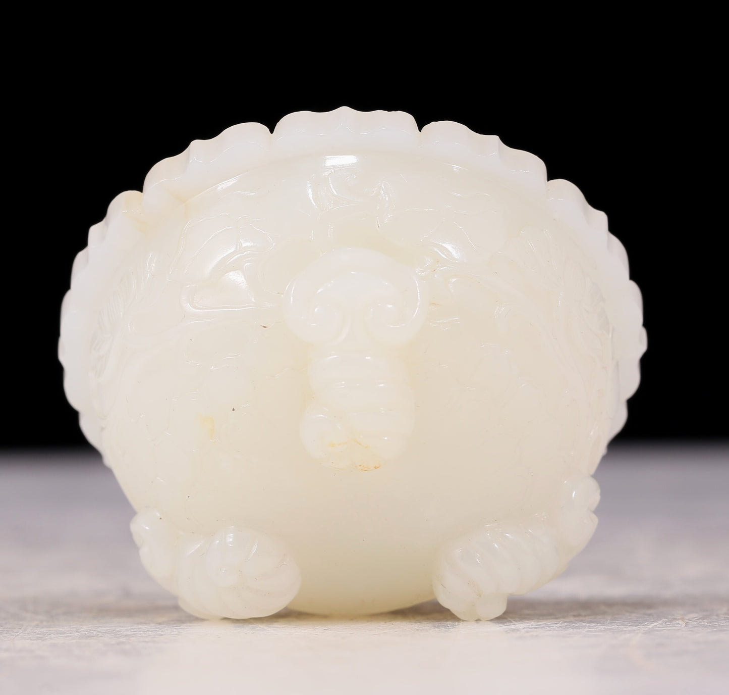 An exquisite white jade tripod censer with flower and bird patterns and lid