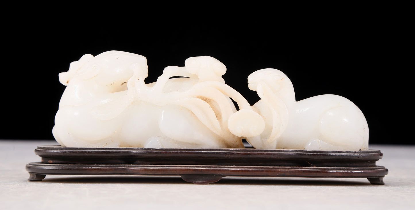 An exquisite white jade double sheep Ruyi ornament