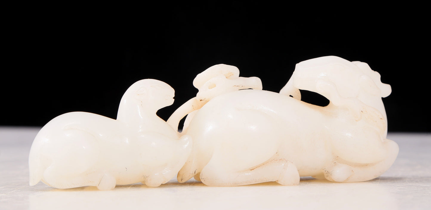 An exquisite white jade double sheep Ruyi ornament