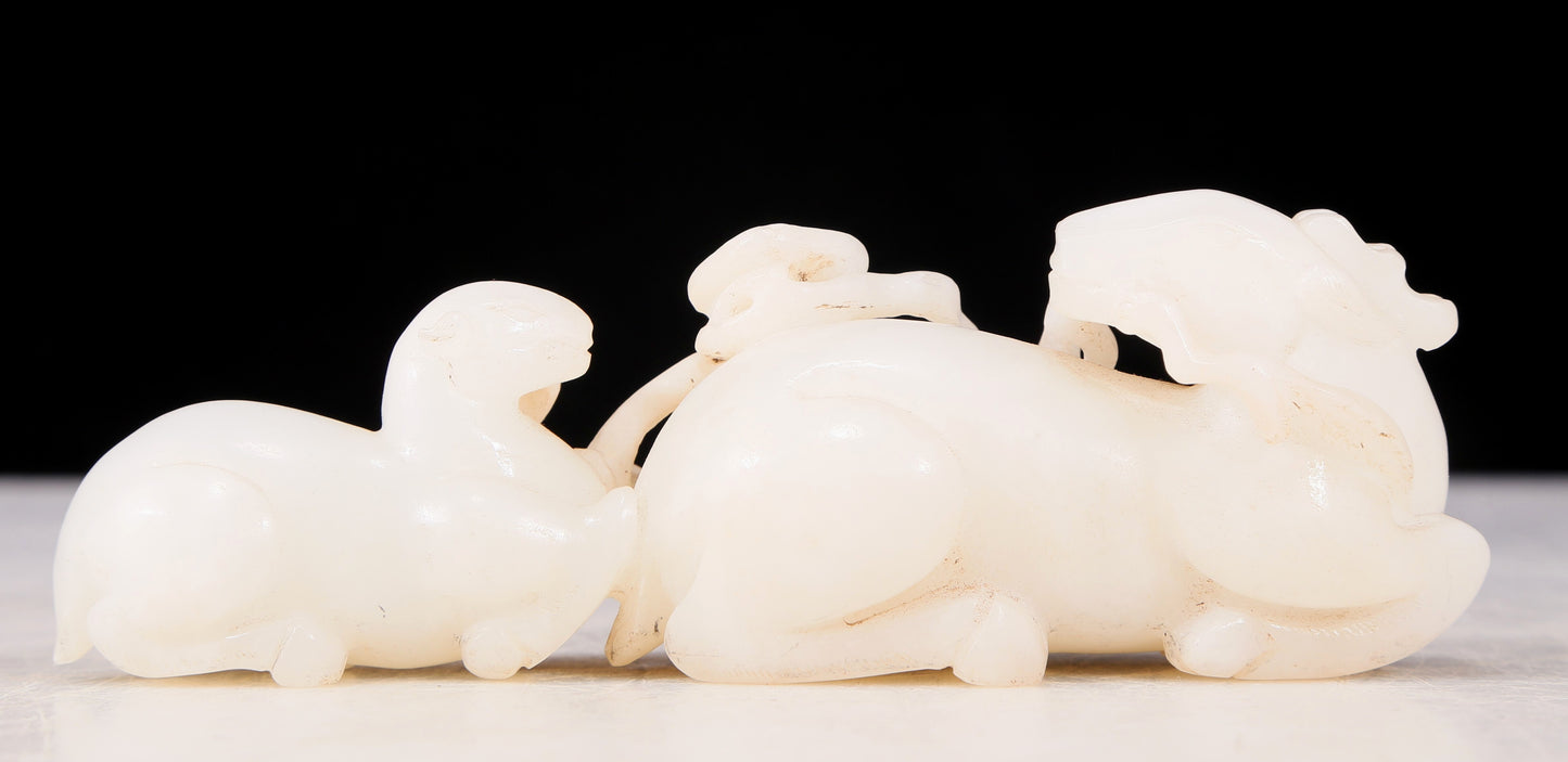 An exquisite white jade double sheep Ruyi ornament