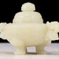 An exquisite white jade tripod censer with dragon pattern and lid