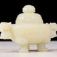 An exquisite white jade tripod censer with dragon pattern and lid