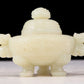 An exquisite white jade tripod censer with dragon pattern and lid