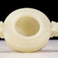 An exquisite white jade tripod censer with dragon pattern and lid