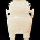 An exquisite white jade four-legged censer with dragon pattern and lid