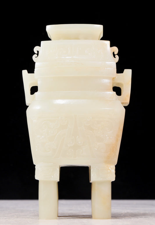 An exquisite white jade four-legged censer with dragon pattern and lid