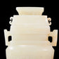 An exquisite white jade four-legged censer with dragon pattern and lid