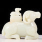 An exquisite white jade sheep-shaped bottle with lid