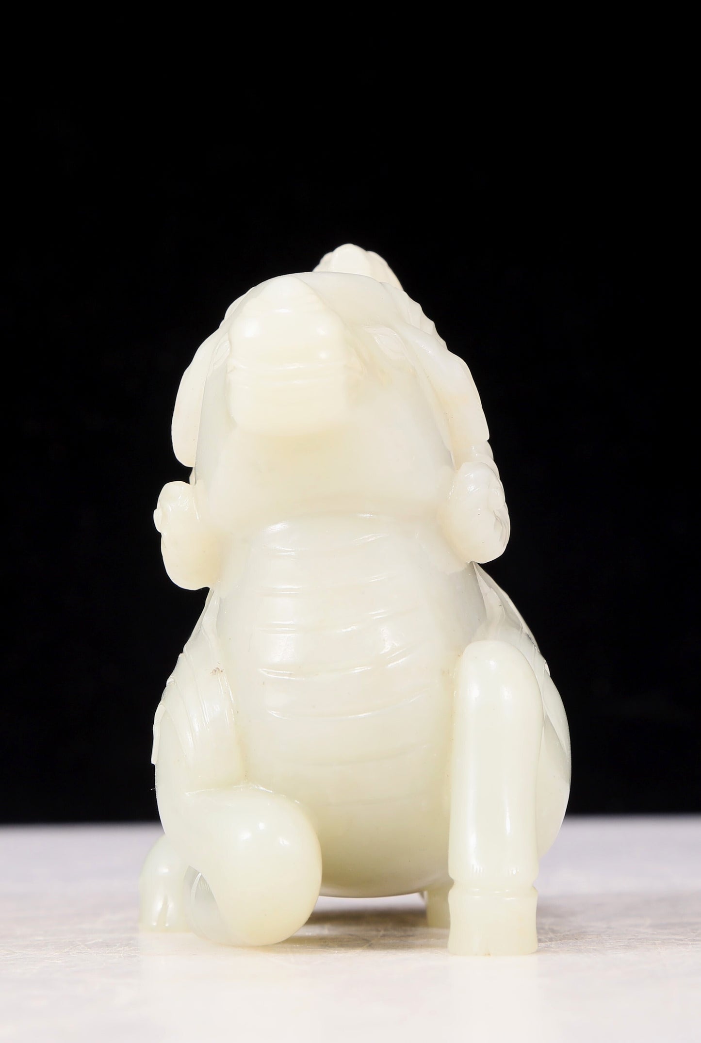 An exquisite white jade sheep-shaped bottle with lid