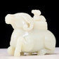 An exquisite white jade sheep-shaped bottle with lid