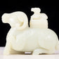 An exquisite white jade sheep-shaped bottle with lid