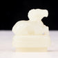 An exquisite white jade sheep-shaped bottle with lid