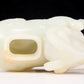 An exquisite white jade sheep-shaped bottle with lid