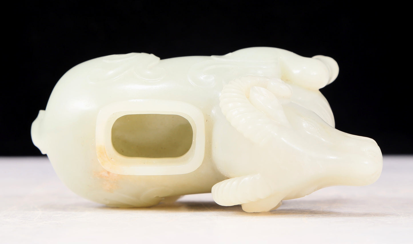 An exquisite white jade sheep-shaped bottle with lid