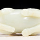 An exquisite white jade sheep-shaped bottle with lid