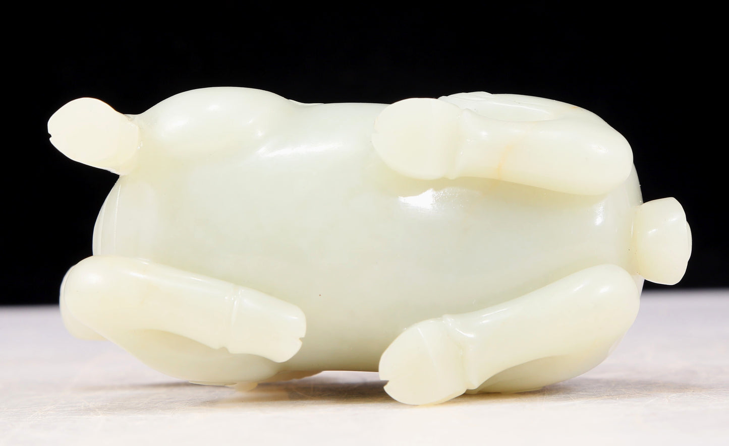 An exquisite white jade sheep-shaped bottle with lid