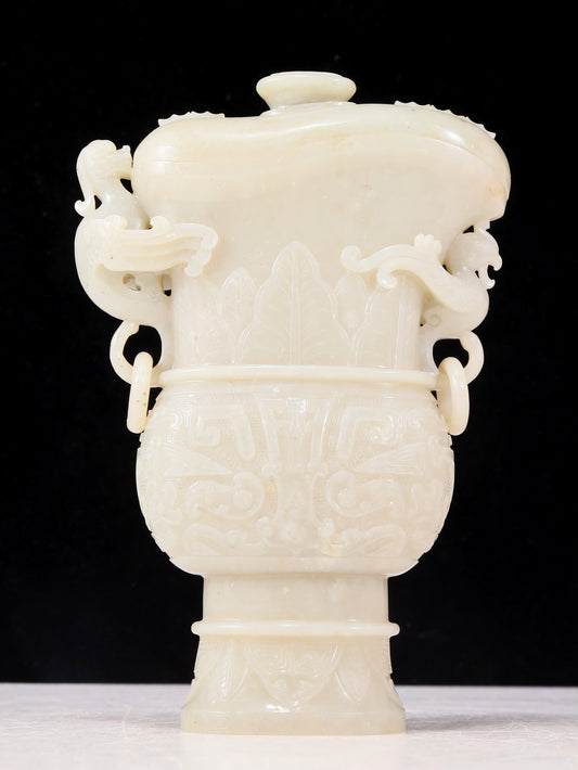 An exquisite white jade animal-faced dragon and phoenix ear bottle with lid