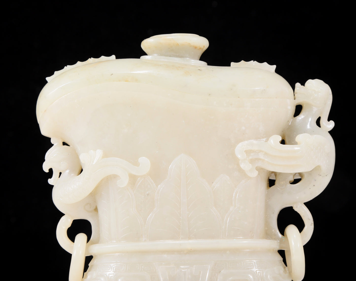 An exquisite white jade animal-faced dragon and phoenix ear bottle with lid