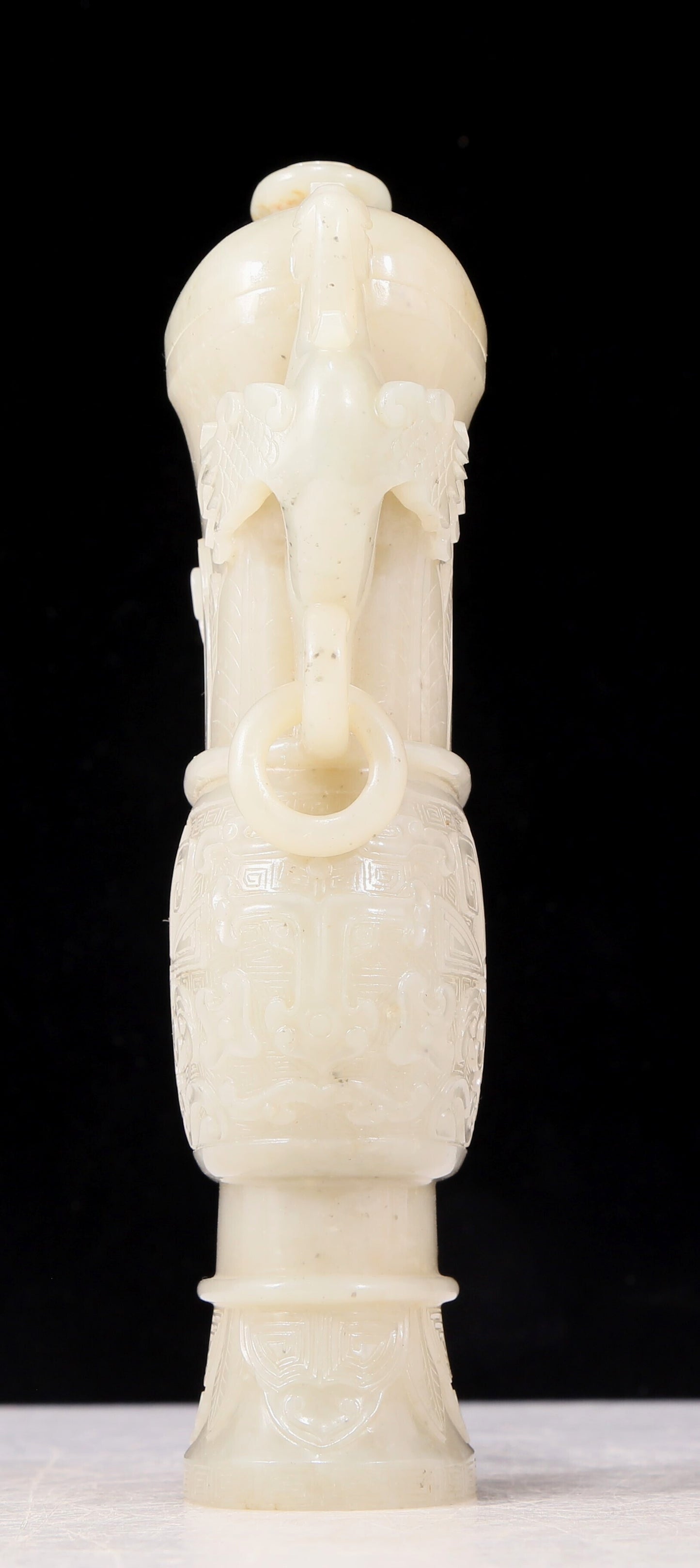 An exquisite white jade animal-faced dragon and phoenix ear bottle with lid