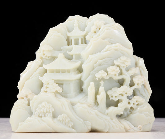 An exquisite white jade landscape figure ornament