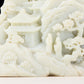 An exquisite white jade landscape figure ornament