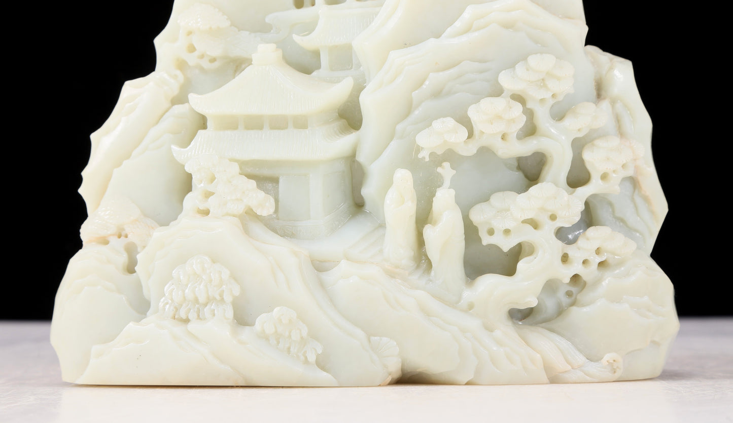 An exquisite white jade landscape figure ornament