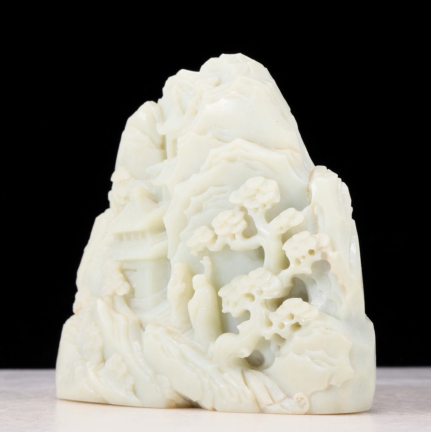 An exquisite white jade landscape figure ornament