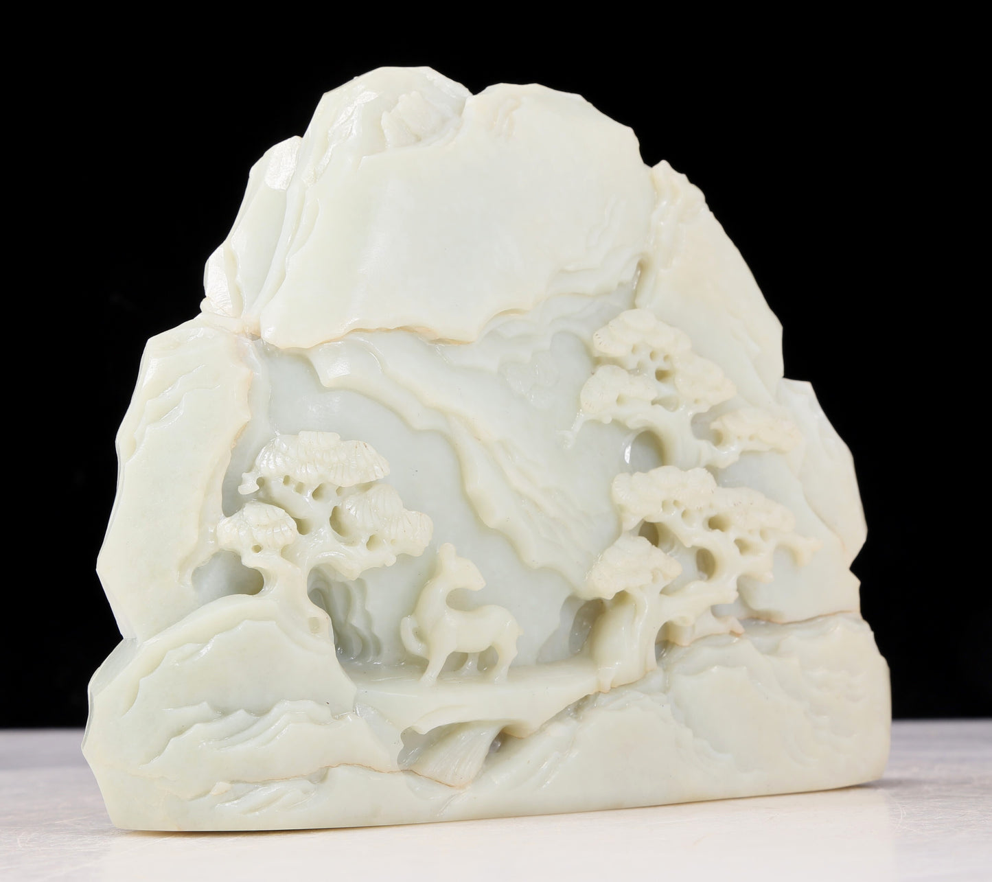 An exquisite white jade landscape figure ornament