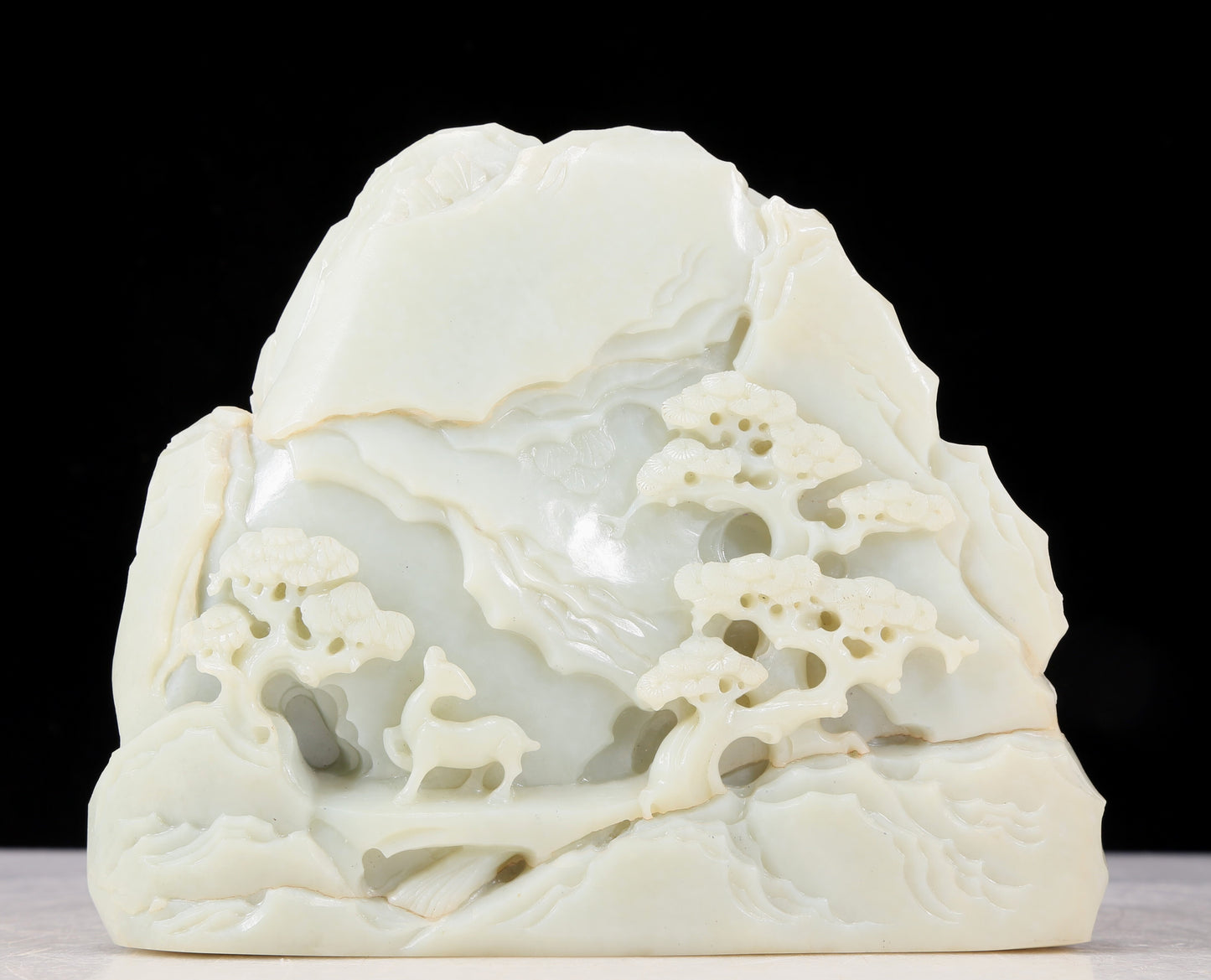 An exquisite white jade landscape figure ornament