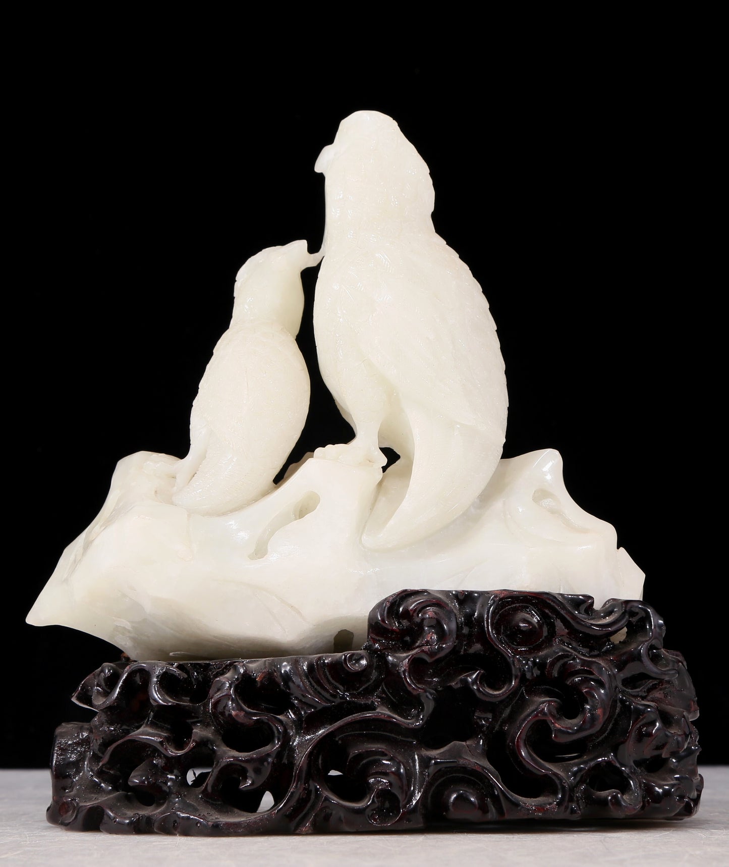 An exquisite white jade bird ornament