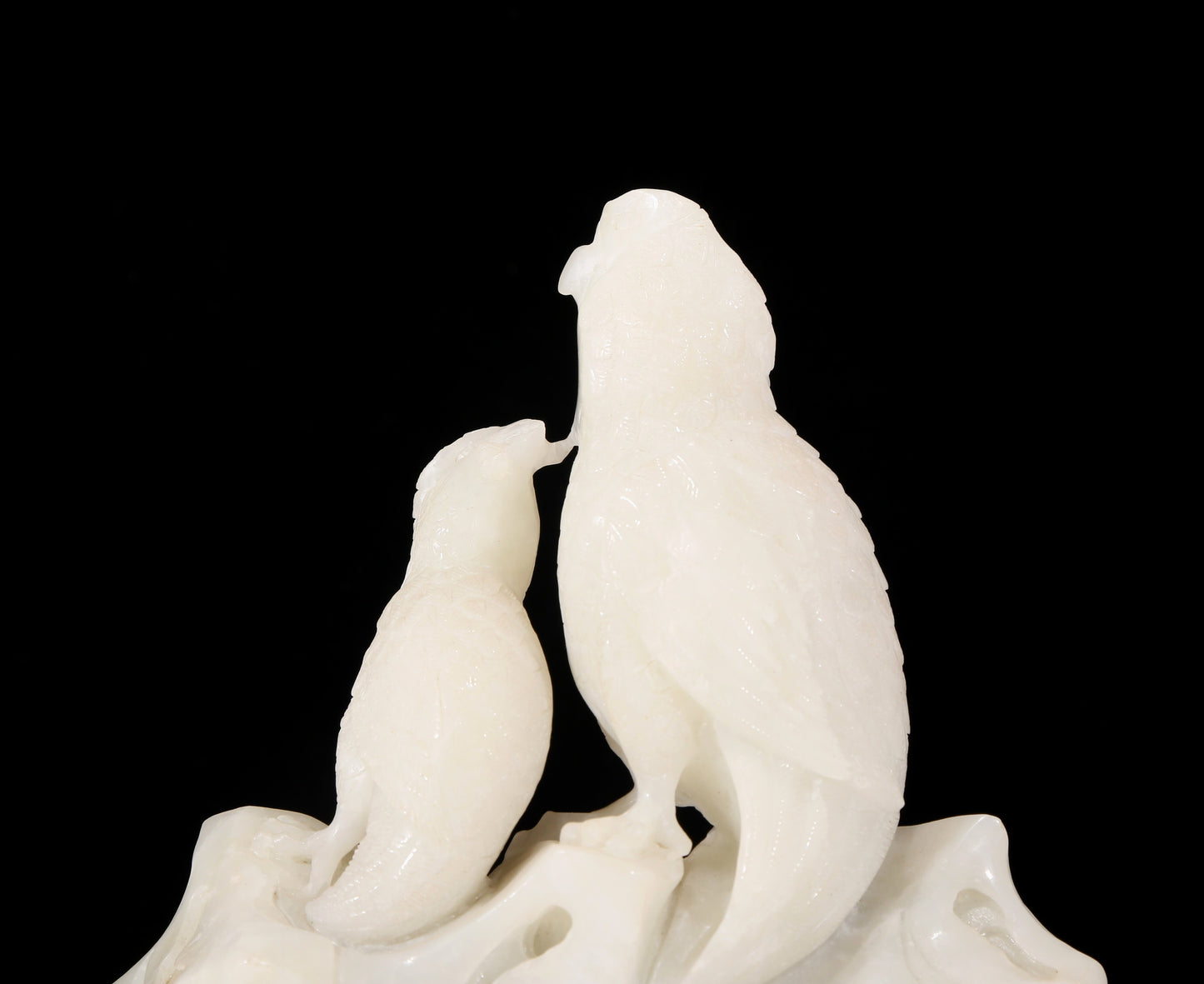 An exquisite white jade bird ornament