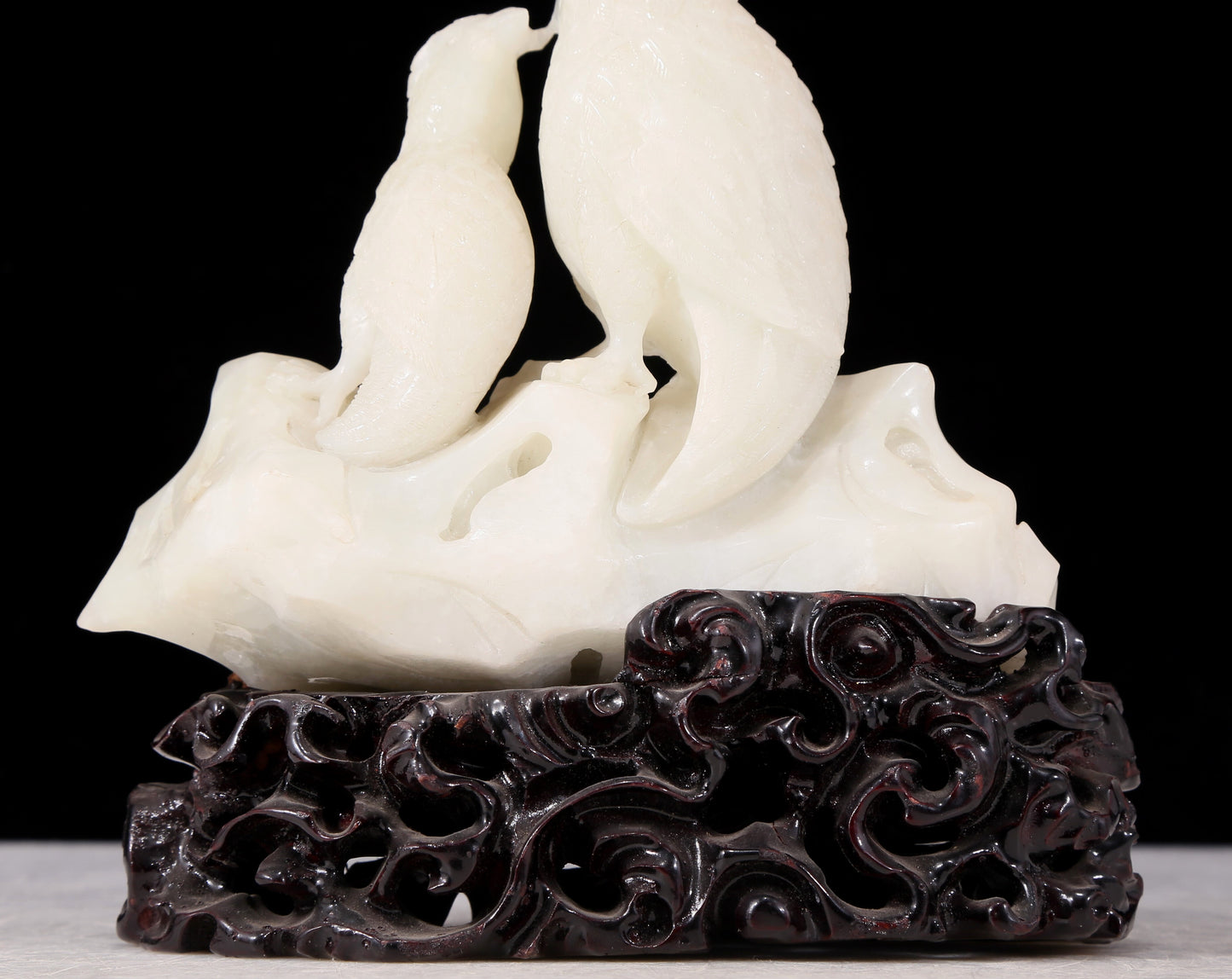 An exquisite white jade bird ornament