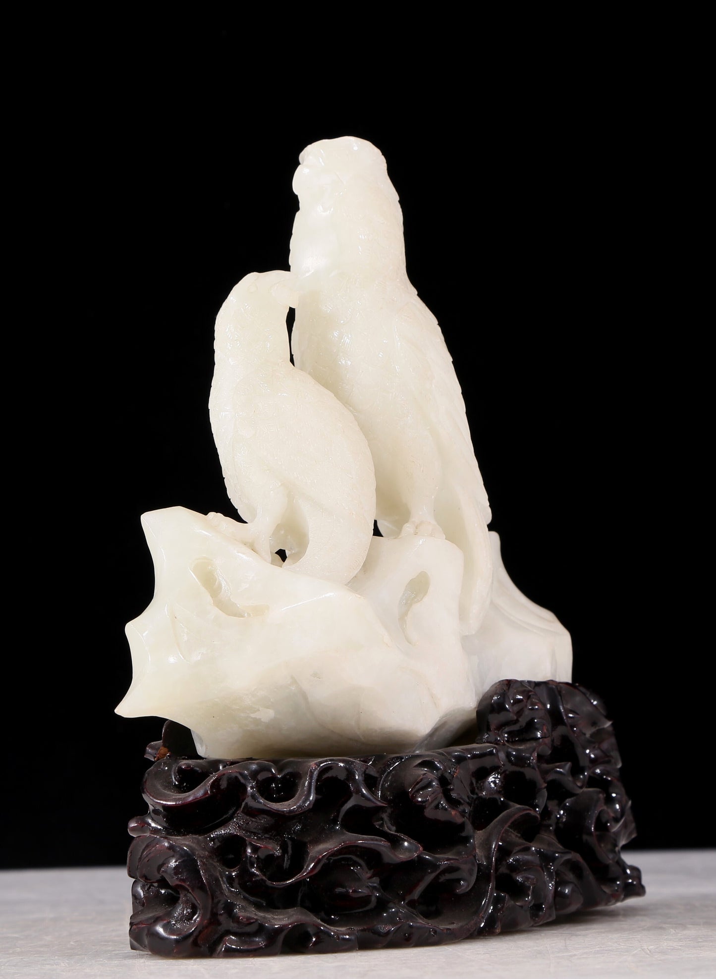 An exquisite white jade bird ornament