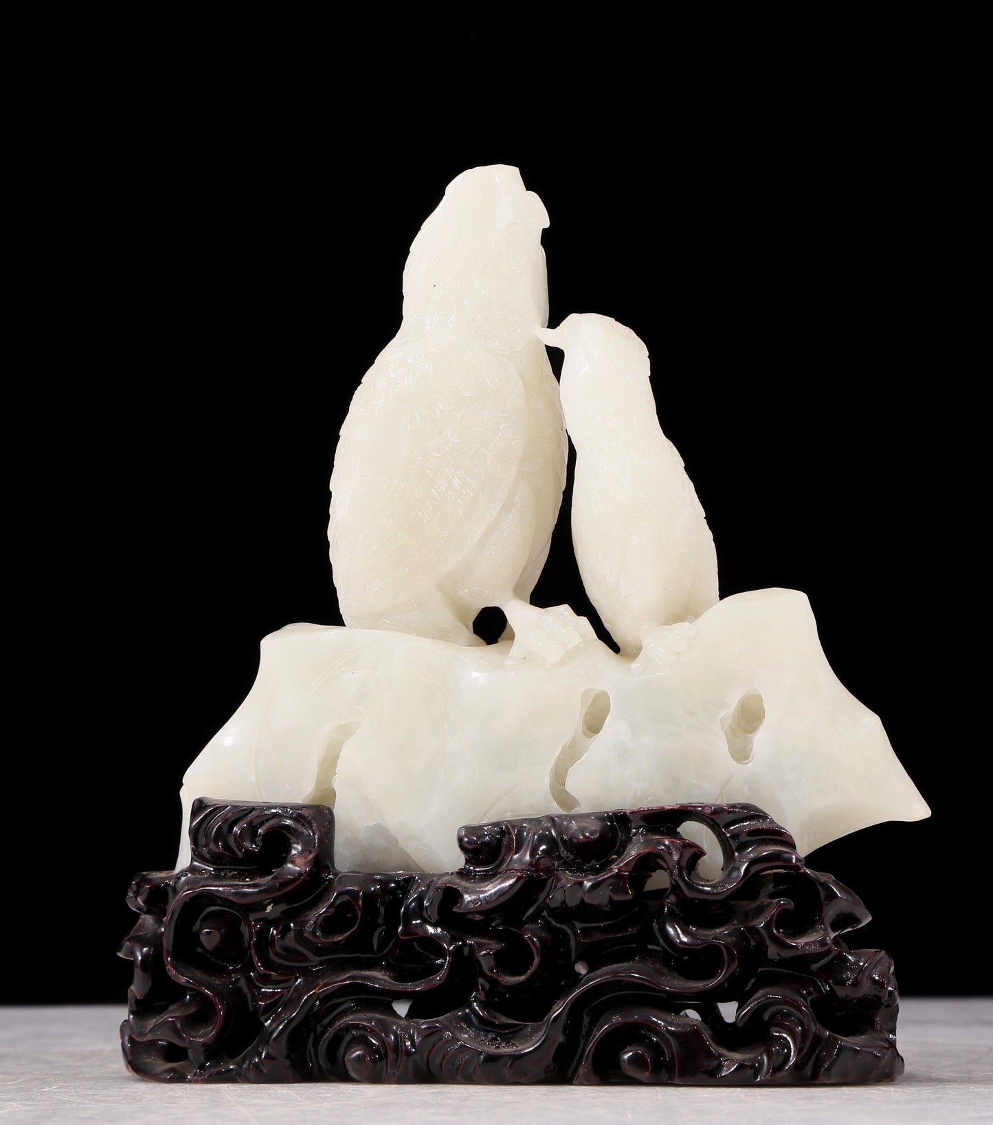 An exquisite white jade bird ornament