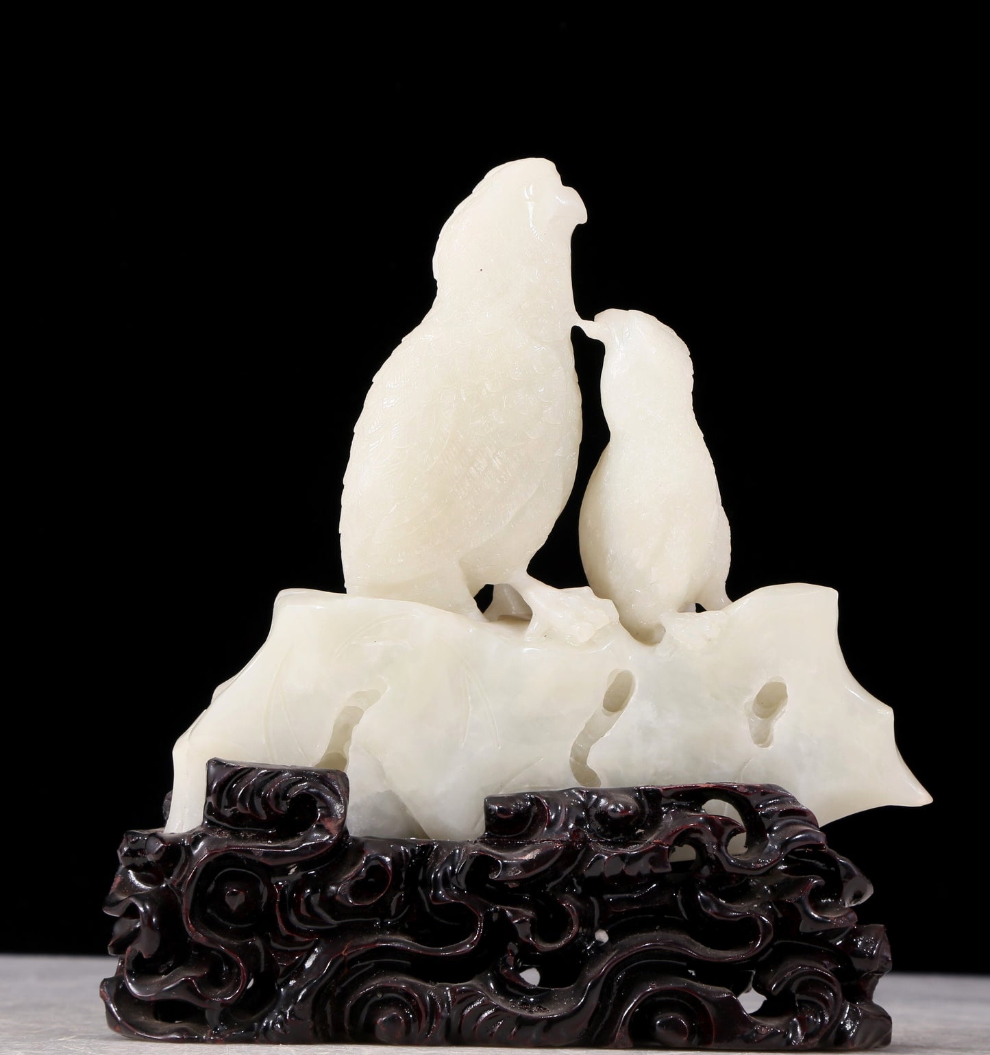 An exquisite white jade bird ornament