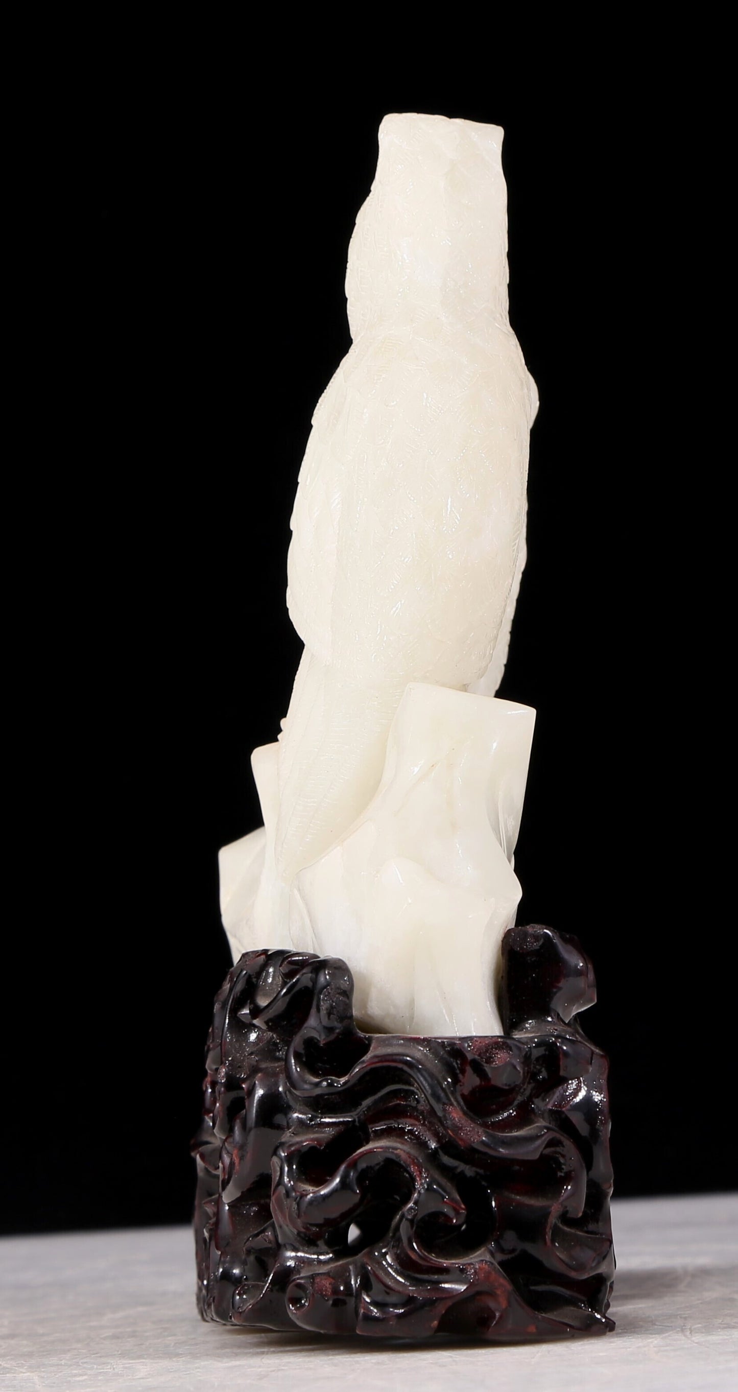 An exquisite white jade bird ornament