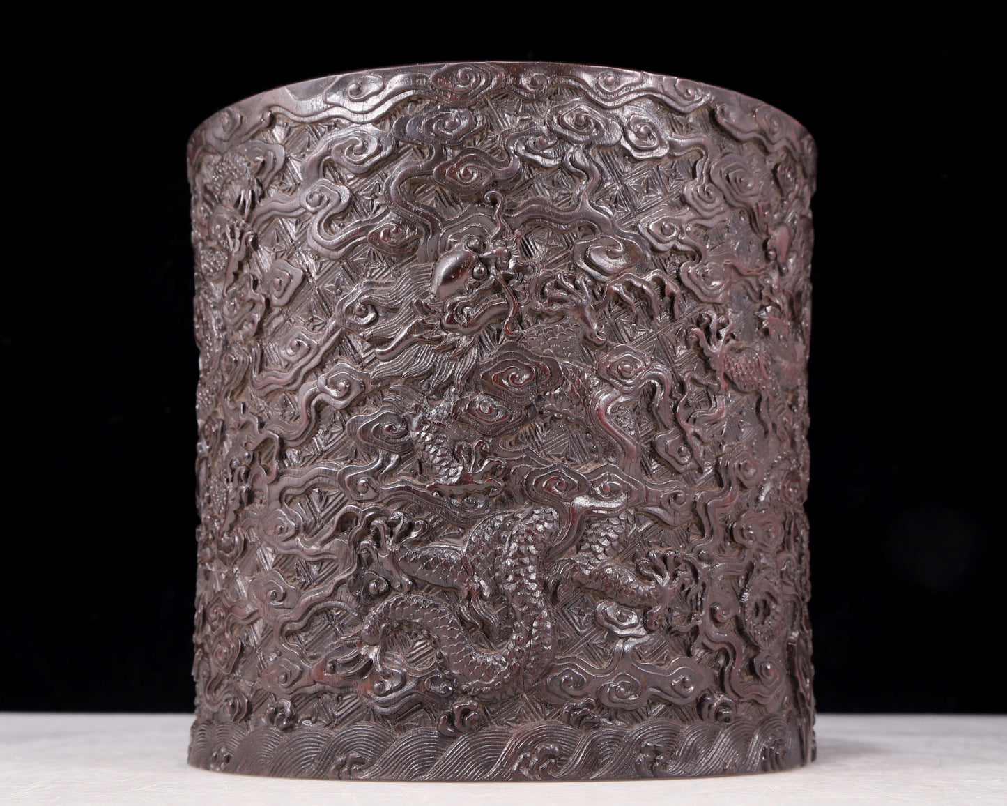 An exquisite zitanwood brush pot with cloud and dragon pattern