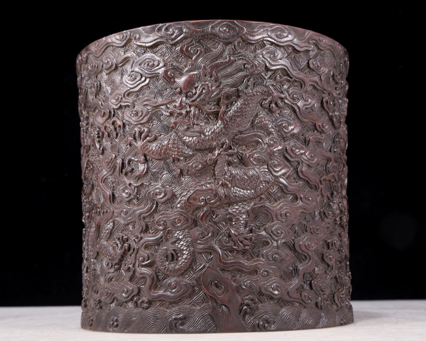 An exquisite zitanwood brush pot with cloud and dragon pattern