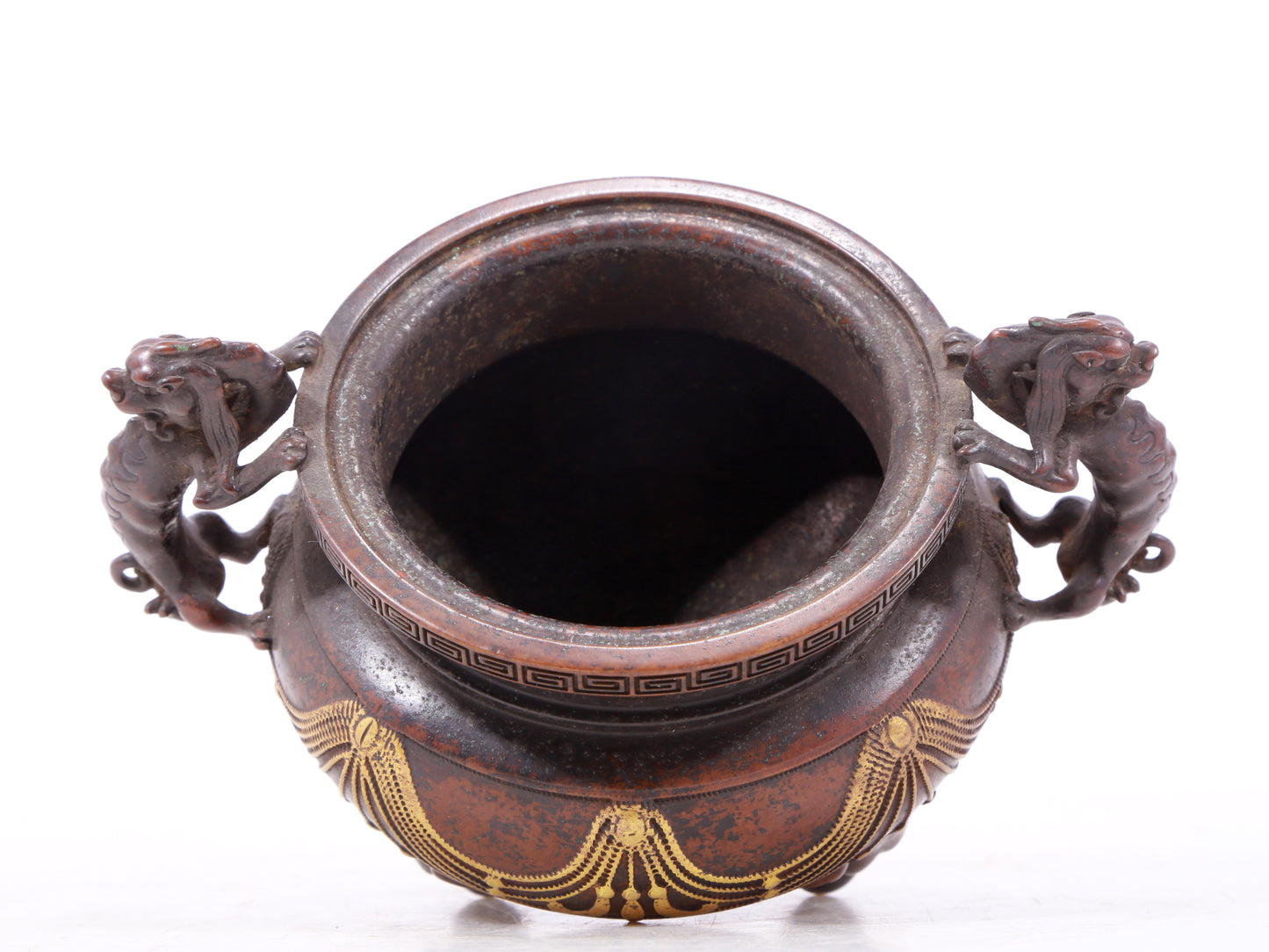 An exquisite gilt bronze elephant-patterned two-eared and tripod censer with lid