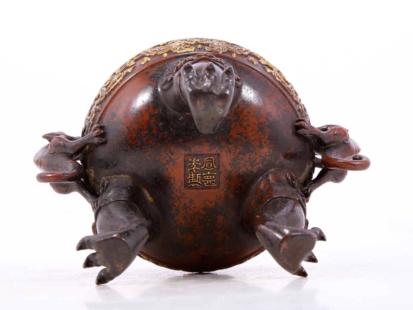 An exquisite gilt bronze double-eared and tripod censer with chilong pattern and lid