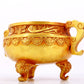 An exquisite gilt bronze censer with double ears and three legs