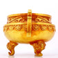 An exquisite gilt bronze censer with double ears and three legs