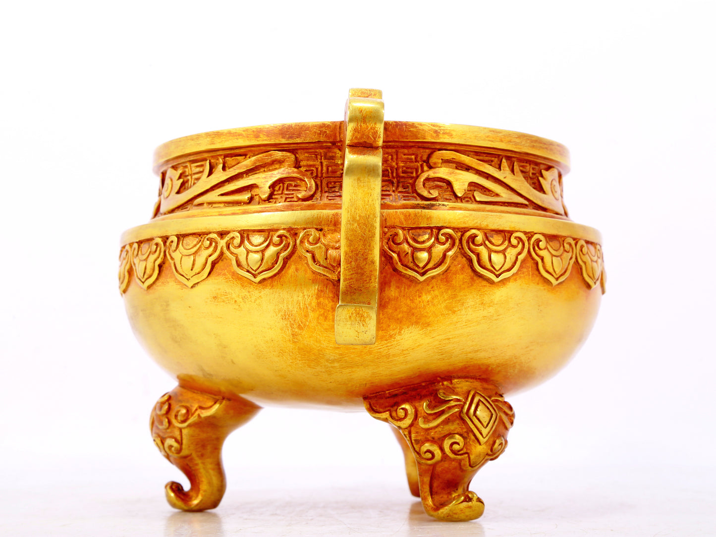 An exquisite gilt bronze censer with double ears and three legs