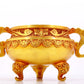 An exquisite gilt bronze censer with double ears and three legs