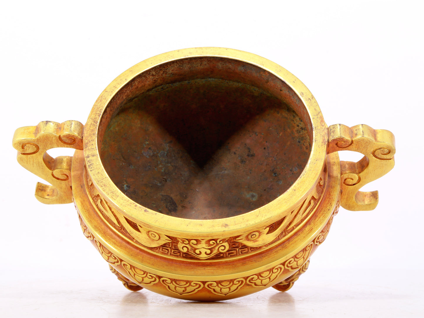 An exquisite gilt bronze censer with double ears and three legs