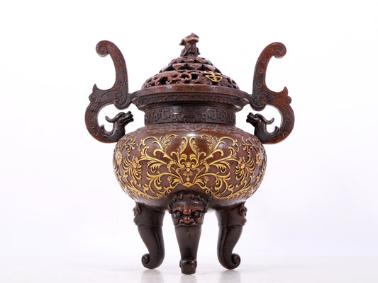 An exquisite gilt bronze censer with lotus and dragon pattern, double ears and three legs with lid