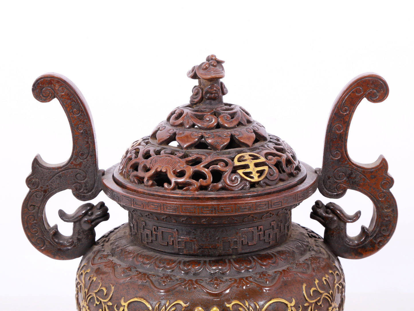 An exquisite gilt bronze censer with lotus and dragon pattern, double ears and three legs with lid