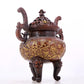 An exquisite gilt bronze censer with lotus and dragon pattern, double ears and three legs with lid