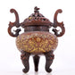 An exquisite gilt bronze censer with lotus and dragon pattern, double ears and three legs with lid