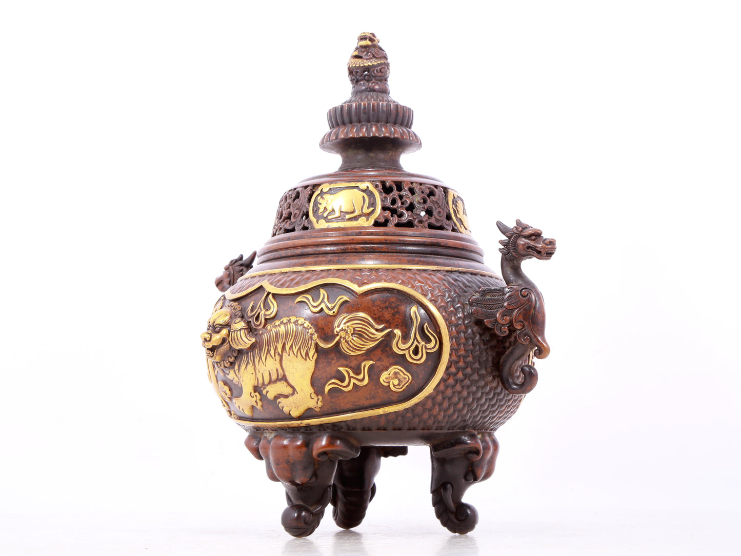 An exquisite gilt bronze censer with double ears and three legs with a lion and dragon pattern and a lid